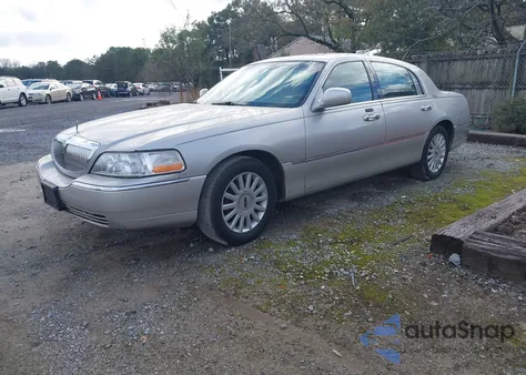 2005 Lincoln Town Car Signature Limited из США, поврежденный, VIN 1LNHM82W65Y668882